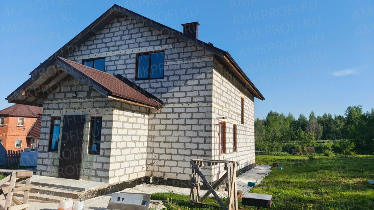 Фасадная отделка с декором с применением панелей АМК (гибкий кирпич). Купить декоративные панели для фасада и внутренней отделки.