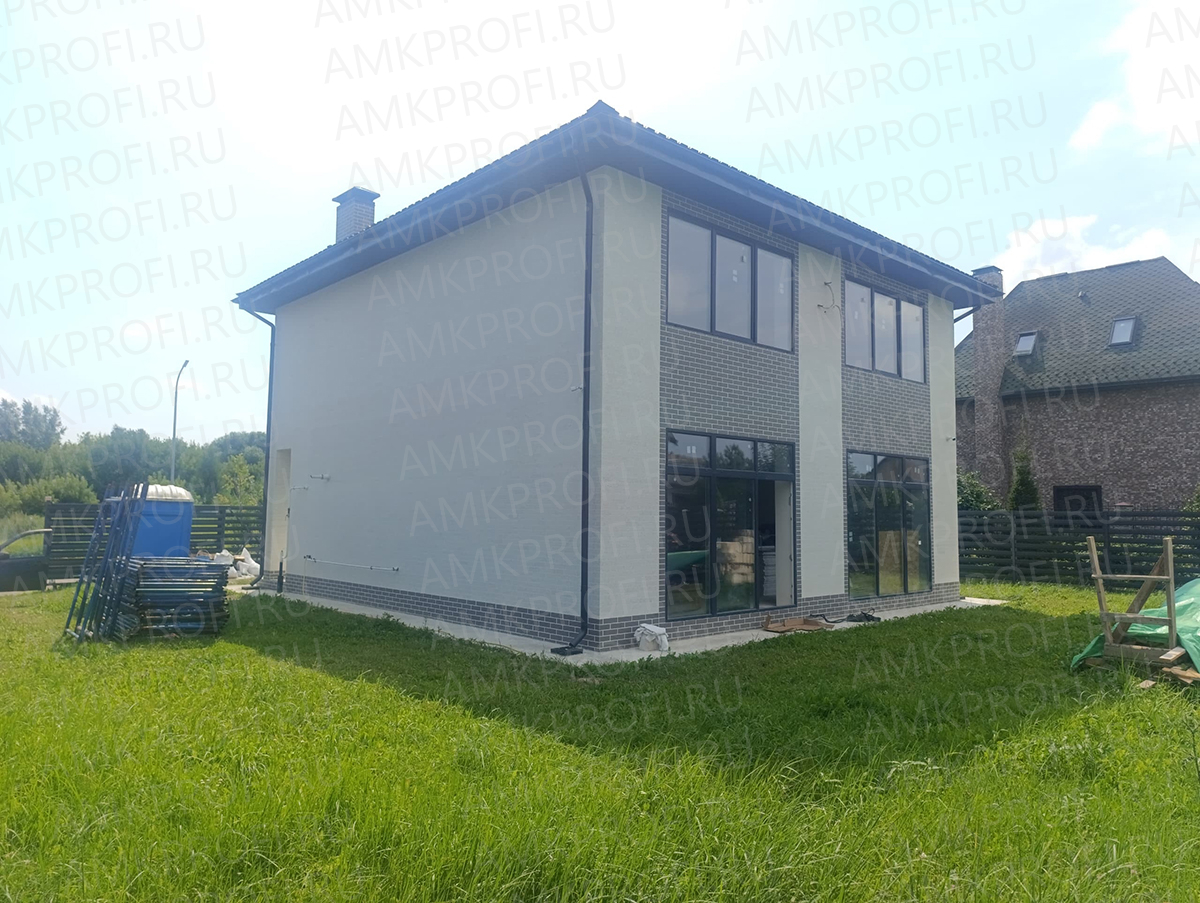 АМК фасад дома с использованием панелей АМК 001 Кирпич и АМК 010 Кирпич, МО, Домодедово. Купить декоративные панели для фасада и внутренней отделки.